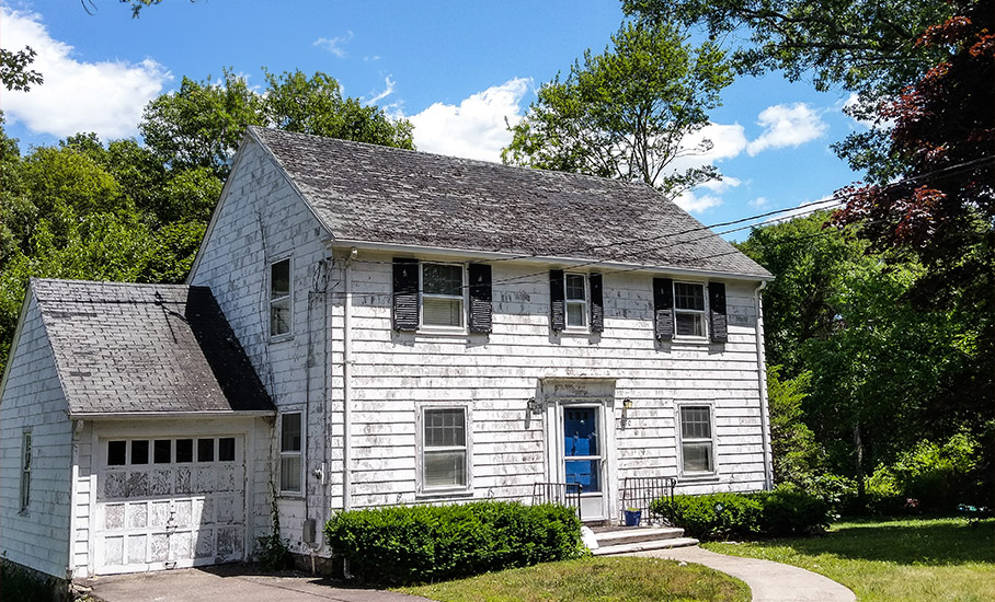 sell a house with an old roof